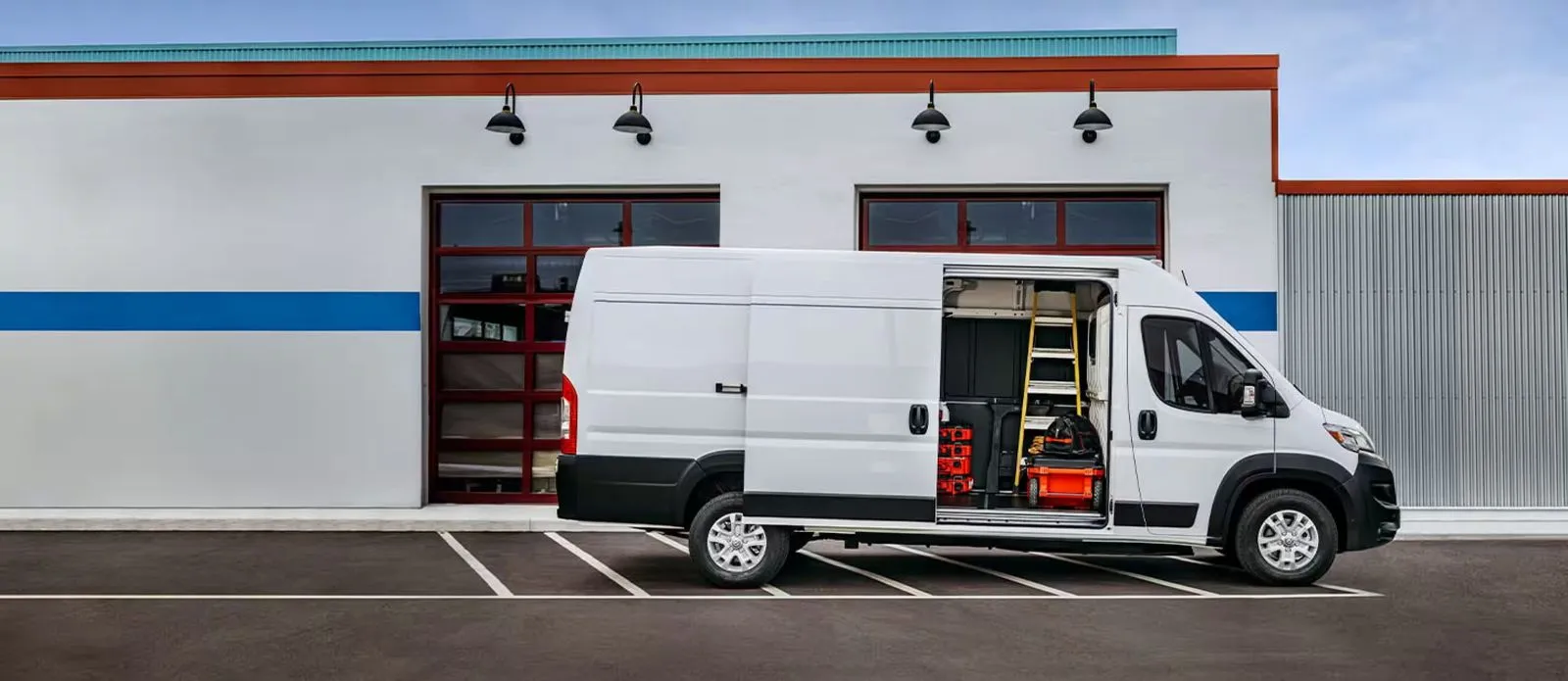 2024 RAM ProMaster EV side view parked - Commercial electric van profile with walk-in pocket door